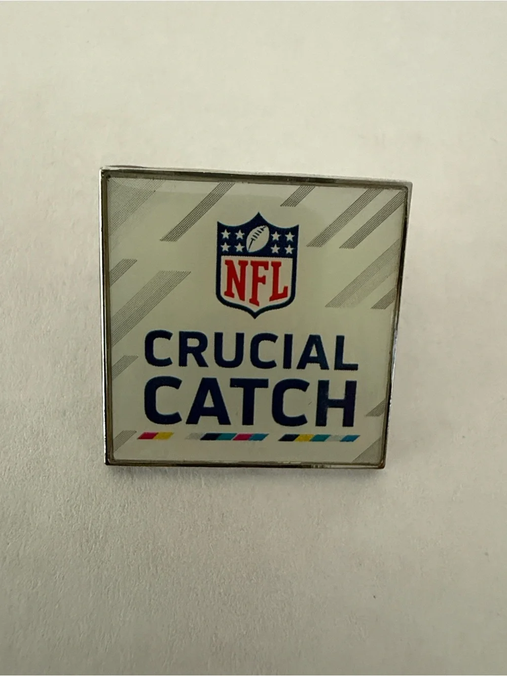 NFL Crucial Catch Brooch in White and Blue with Accent Stripes